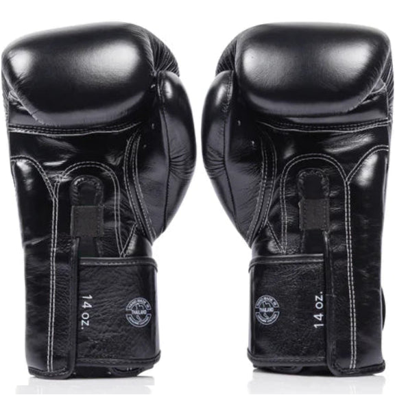 Pair of twins special black boxing gloves on a white background