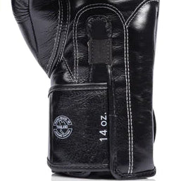 Pair of black boxing gloves on a white background