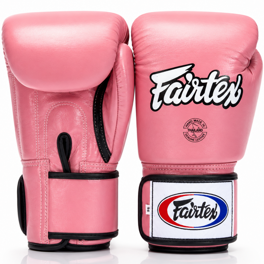 Pink boxing gloves with Fairtex logo on a white background