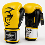 A pair of Pretorian boxing gloves in yellow and black, shown against a light gray background with promotional text and care instructions. The gloves feature a bold black logo and branding, and the image includes text detailing the product options and care guidelines.