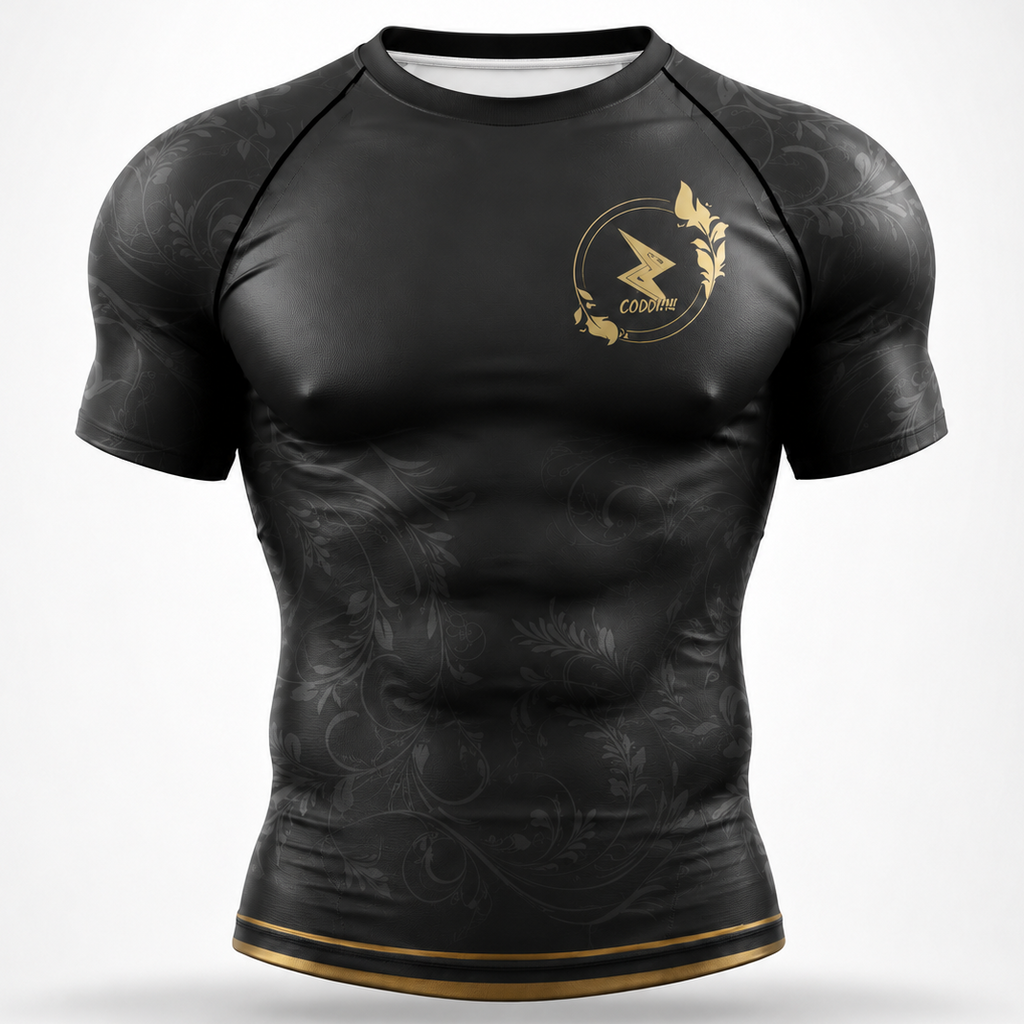 A black short-sleeve athletic rash guard with a subtle tonal floral pattern, featuring a gold circular logo on the left chest with a lightning bolt and the word 'crash'.