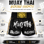 Black and gold Muay Thai boxing shorts with white text, shown on a white and gray background with feature callouts and the brand name QNGPAL.