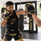 Venum MMA 4oz Boxing Gloves | Black & Gold