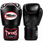 Black boxing gloves with Twins Spirit logo on a white background