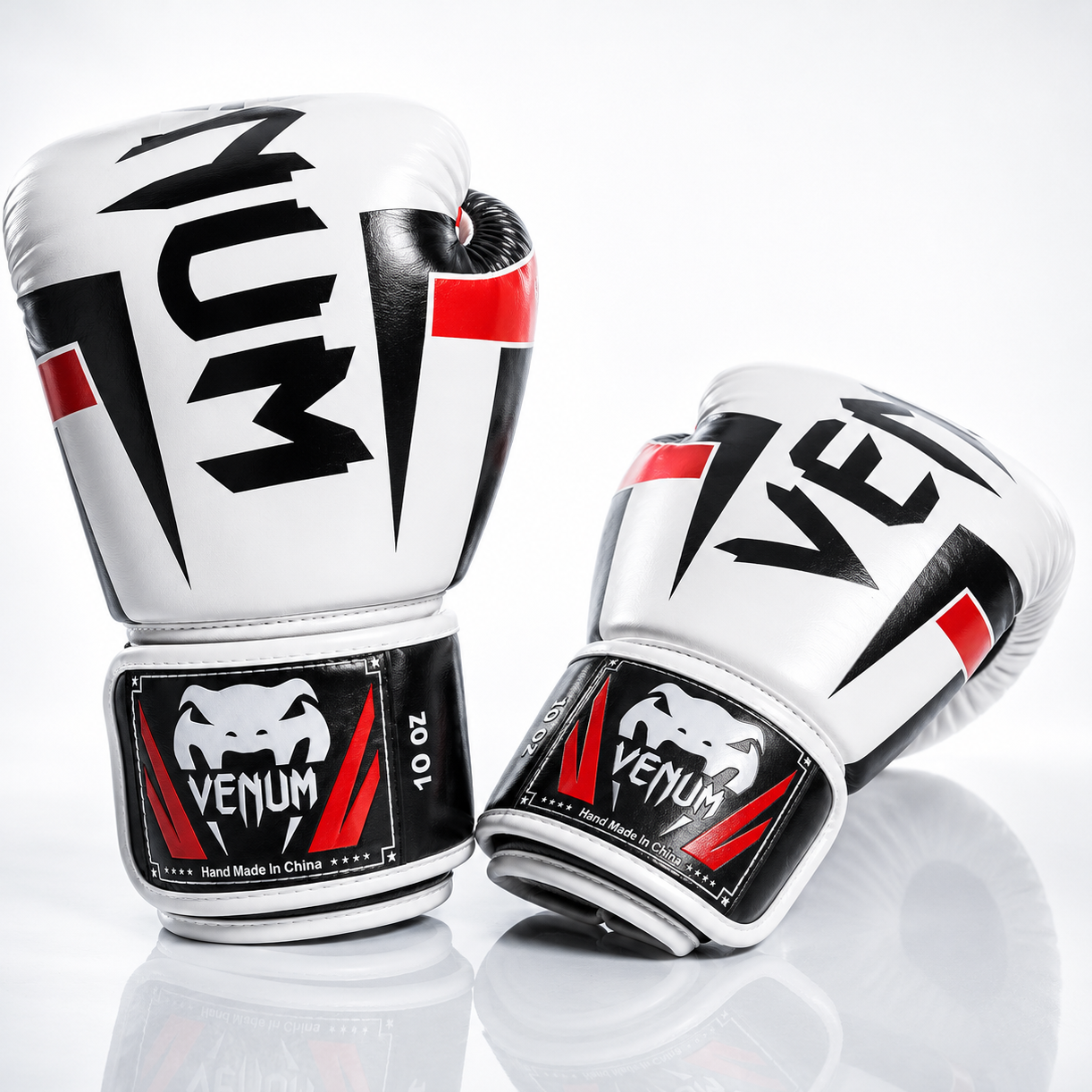 Pair of Venum boxing gloves on a white background