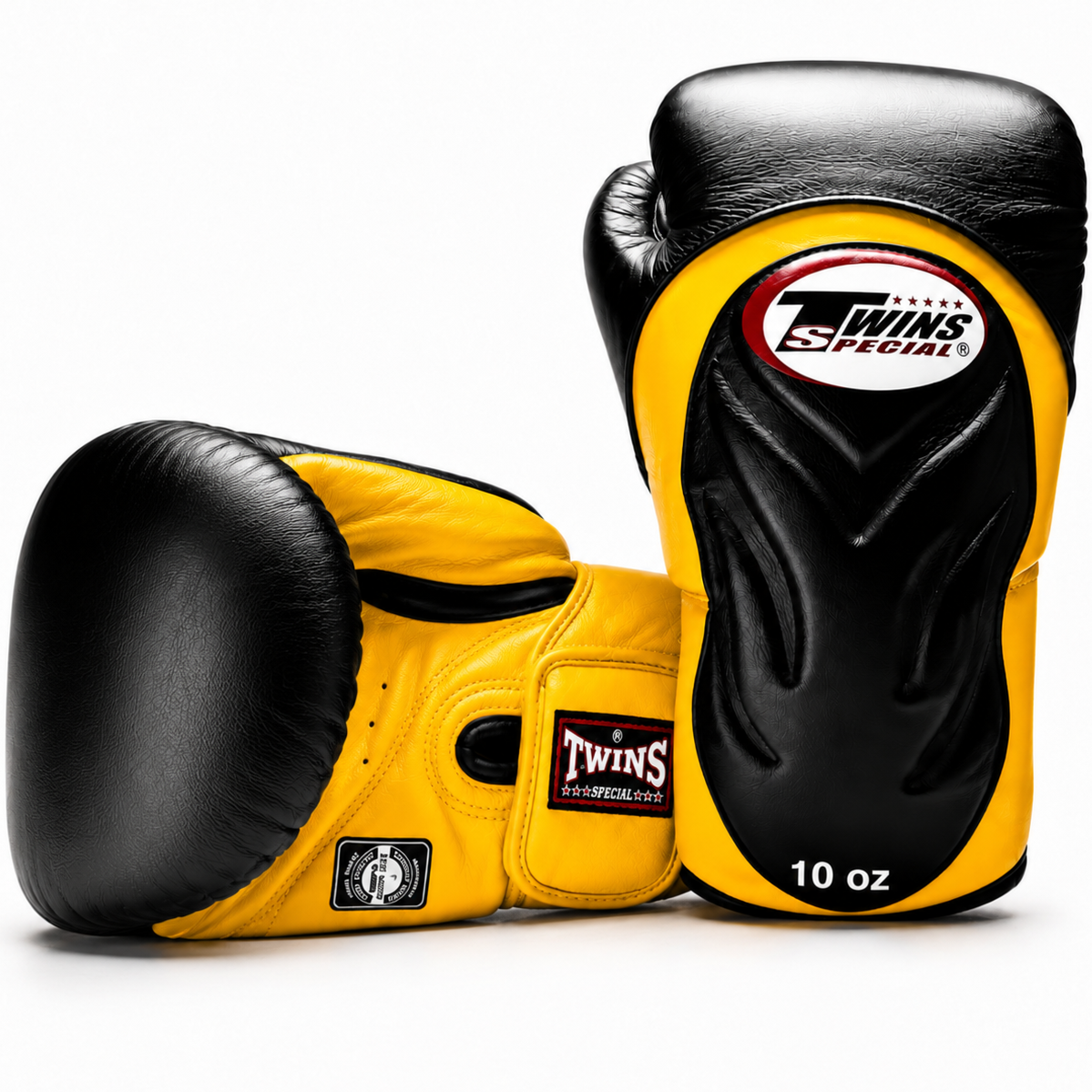Black and yellow Twins Special boxing gloves on a white background