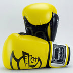 Yellow and black boxing gloves with a brand logo on a gray background