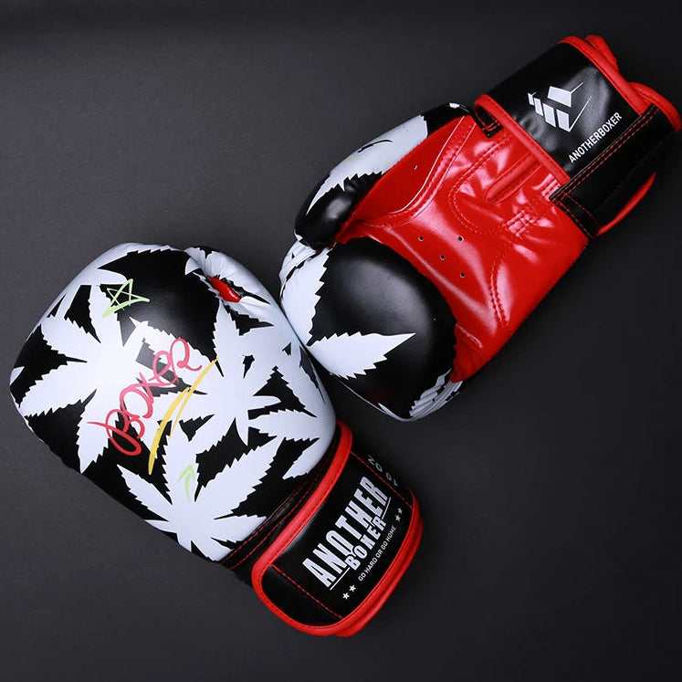 Pair of boxing gloves with black, white, and red design on a dark background