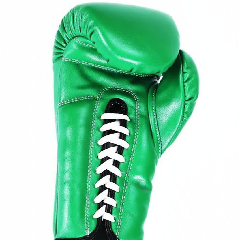 Green boxing glove with white laces on a white background