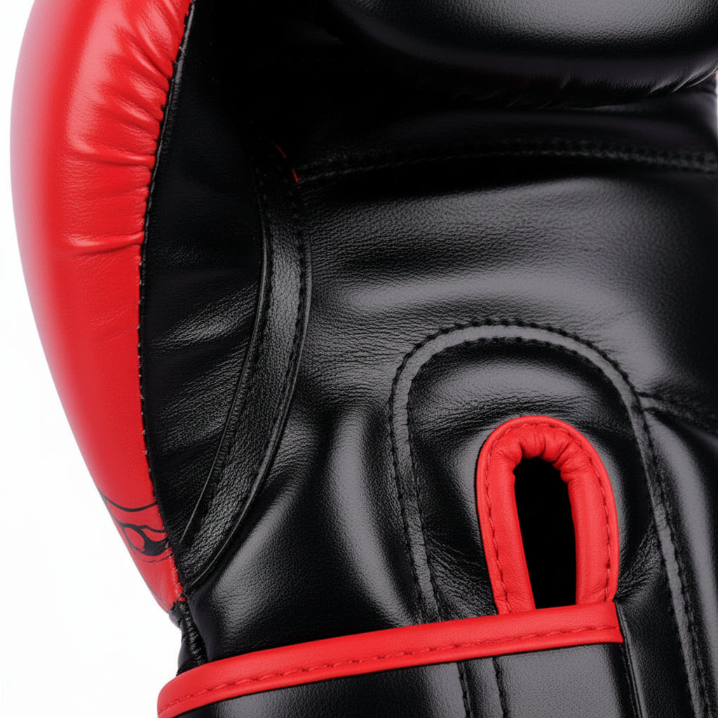 Black and red boxing gloves with dragon design on a white background