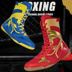 Red and blue boxing shoes with gold accents on a black background