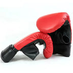 Red and black boxing gloves on a white background