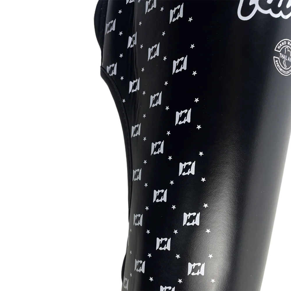 Fairtex Black sleeveless top with white geometric pattern on a white background