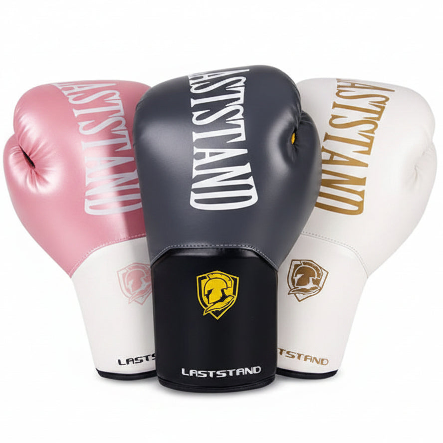 Four boxing gloves in pink, black, white, and red with 'LASTSTAND' branding on a white background.