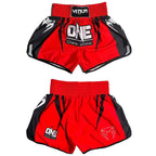 Two pairs of red and black Venum Muay Thai shorts displayed against a white background, showing both the front and back views. The front pair features a red waistband with a black Venum logo patch, a large 'ONE Championship' logo on the front, and black side panels with white graphic details.