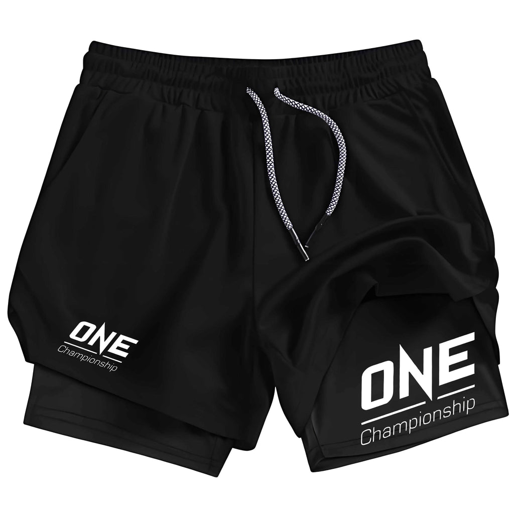 Black athletic shorts with white 'ONE Championship' logos on the left and right legs, featuring a white drawstring, shown against a plain white background.