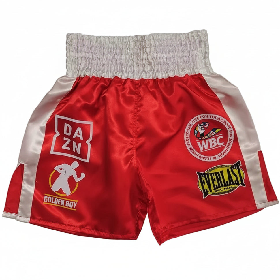 Red boxing shorts with logos on a gray background