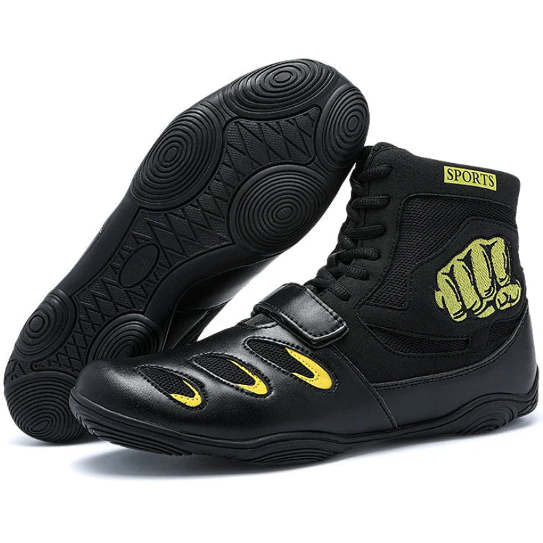 Black high-top sneakers with yellow accents on a white background