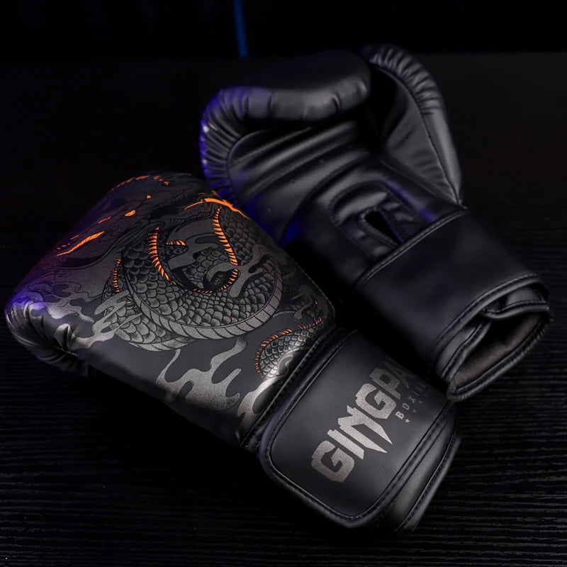 Black boxing gloves with dragon design on a dark background