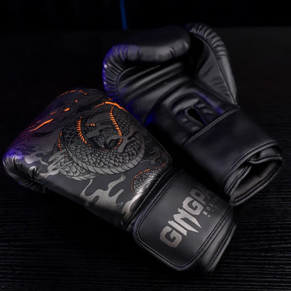 Black boxing gloves with dragon design on a dark background
