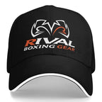 Rival black baseball cap featuring a white and orange embroidered logo that reads 'RIVAL BOXING GEAR' on the front, with a white contrast trim along the curved brim, shown against a plain white background.
