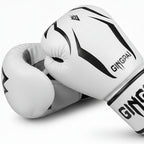 White boxing gloves with black designs and 'Gingpai Boxing' branding on a white background