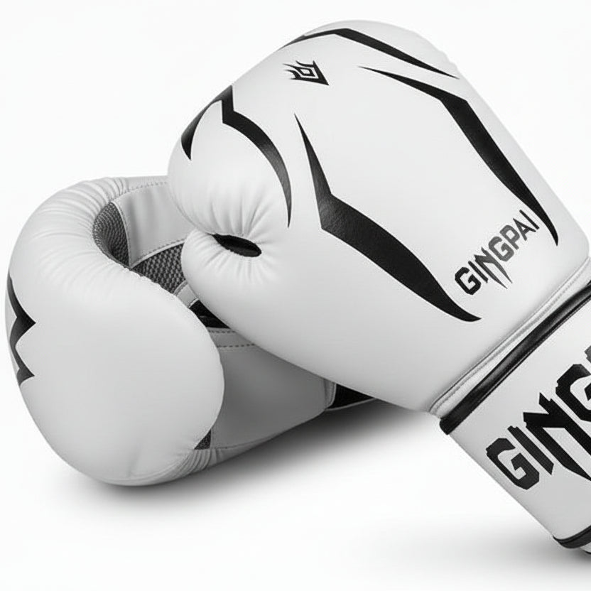 White boxing gloves with black designs and 'Gingpai Boxing' branding on a white background
