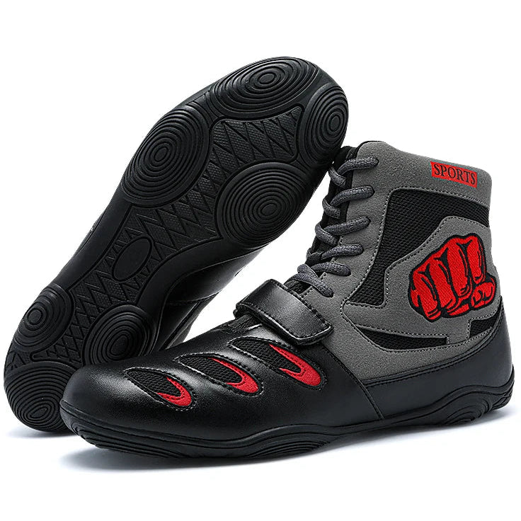 Black and gray high-top sneakers with red accents on a white background