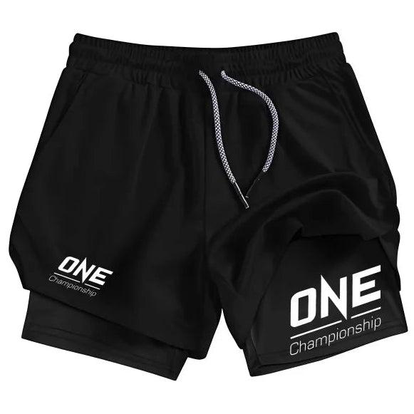 Black athletic shorts with a white drawstring and white 'ONE Championship' branding printed on both legs, displayed on a clean white background.