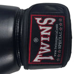 Black boxing glove with Twins Special logo on a white background