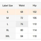 A size chart table on the left showing waist, hip, pants length, and inseam measurements for sizes S through XXL, alongside a pair of black shorts on the right.