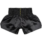 Black athletic shorts with a branded logo on a white background