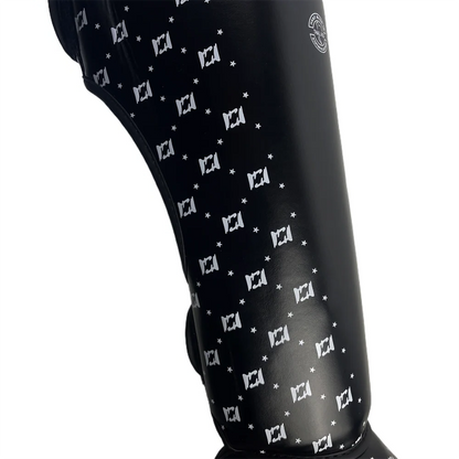 Black hair dryer with white pattern on a white background