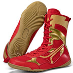 Red and gold high-top boxing shoes on a white background