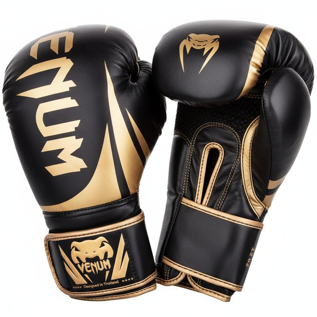 Black and gold boxing gloves with Venum branding on a white background