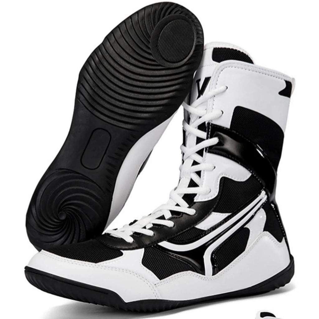 Black and white high-top sneakers with a detailed sole on a white background