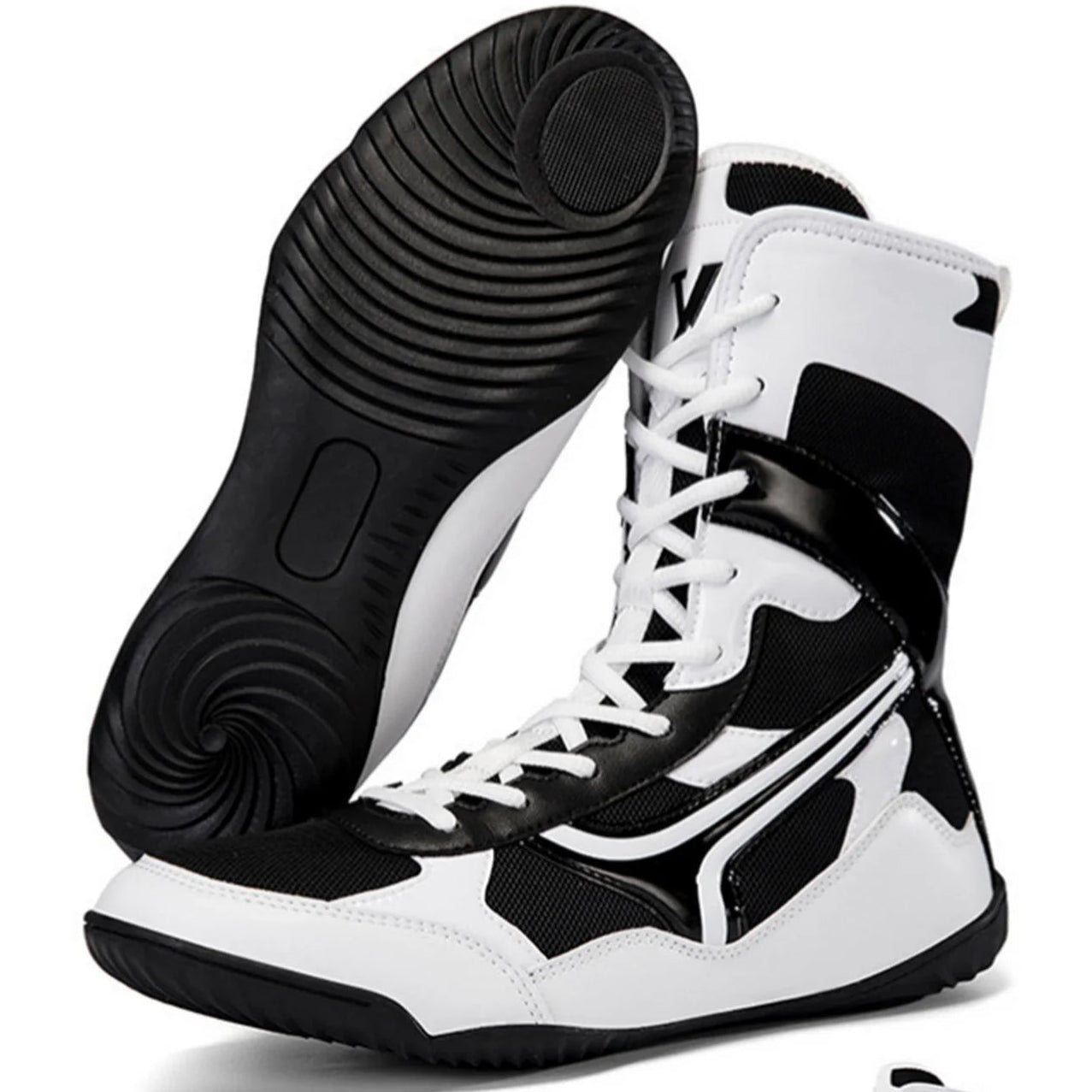 Black and white high-top sneakers with a detailed sole on a white background