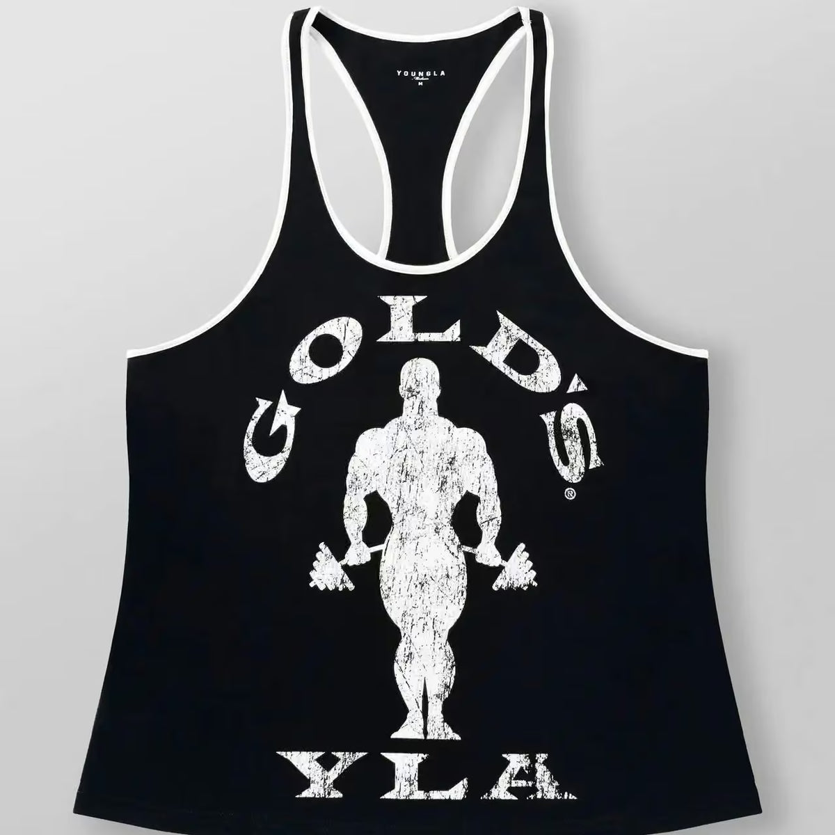 A black racerback tank top with white trim and a distressed white graphic of a muscular bodybuilder holding dumbbells, with the text 'GOLD'S YLA' on the front, shown against a light gray background.