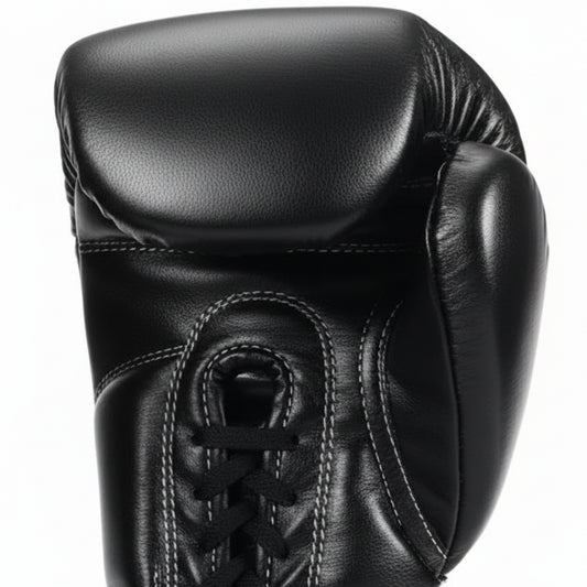 Black boxing gloves with Kuguan branding on a white background