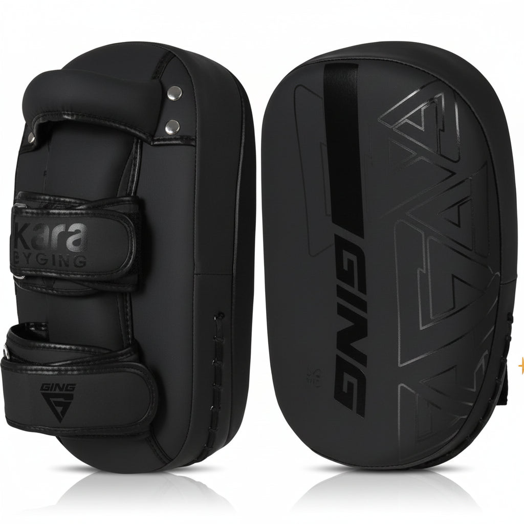 Kicking pads with red and black branding on a white background