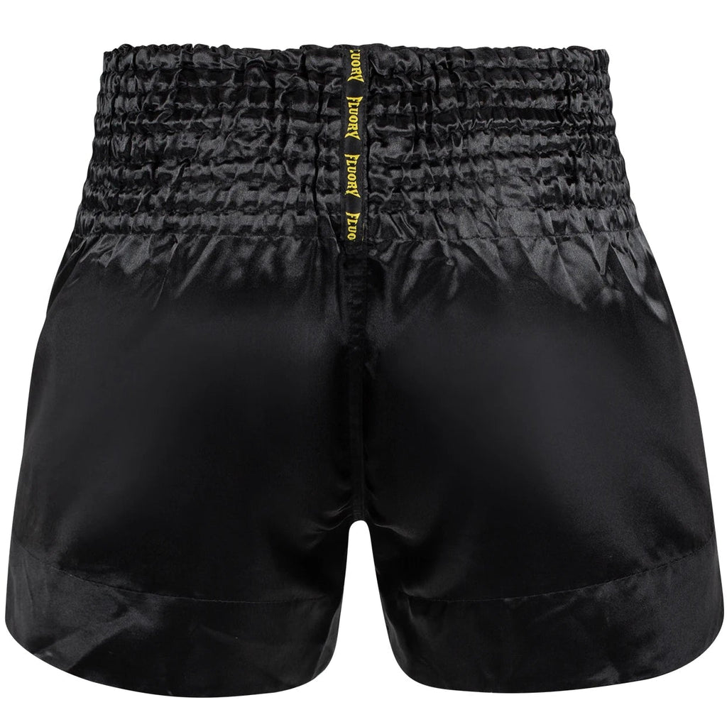 Black athletic shorts with a yellow logo on a white background, featuring the brand 'FLUORY'.