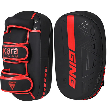 Black and red Kara GING martial arts training pads on a white background