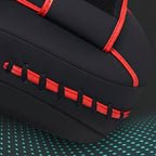 Black and red product with stitching detail on a textured surface