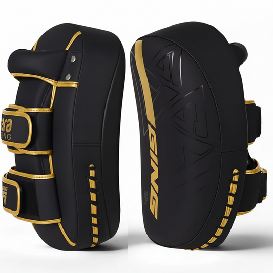 Black and gold knee pads with 'Ringside' branding on a white background