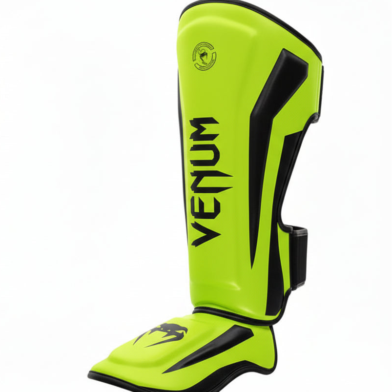 Green Venum shin guards on a white background