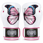 A pair of white boxing gloves featuring a large pink, black, and blue butterfly graphic on the back. The wrist area has pink trim and a black brand patch that reads GINGPAI SPORTS.