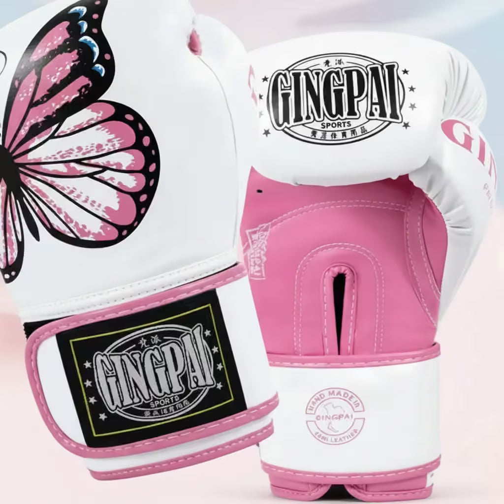 Pink and white boxing gloves with butterfly design and Gingpa branding on a light pink background.