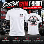 Custom white gym t-shirt mockup shown front and back on a dark gym background. The front features a small black 'GYM TEAM' logo with a dumbbell graphic, and the back features a larger graphic of a weightlifter with 'GYM TEAM STRONGER TOGETHER' inside a red circle.