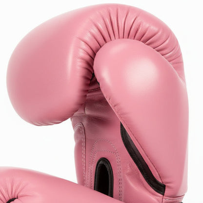Pink boxing gloves with 'Fairtex' branding on a white background