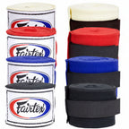 Set of Fairtex hand wraps in red, blue, black, and white packaging.